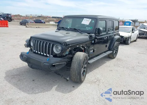 2022 Jeep Wrangler 4Xe Unlimited Sahara 4X4 из США, поврежденный, VIN 1C4JJXP69NW269462